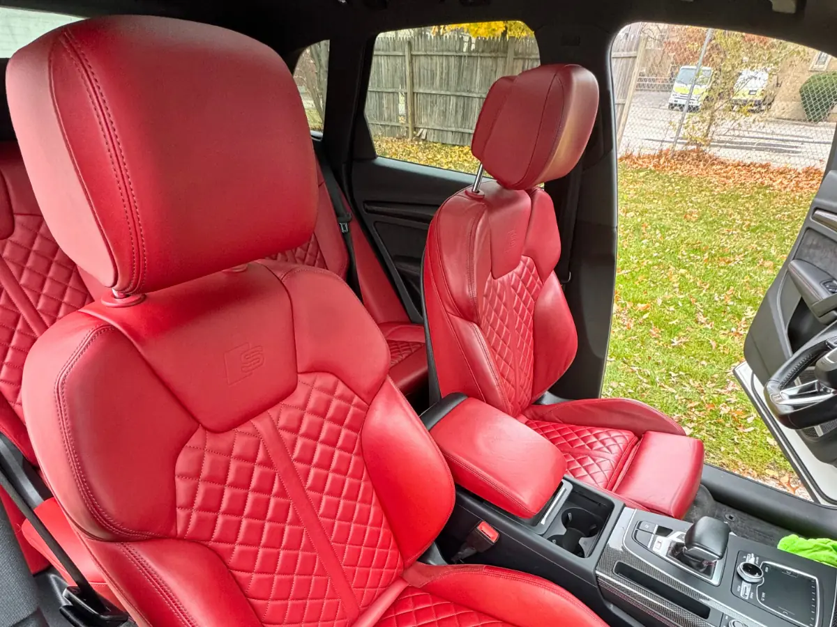 Red leather interior after professional detailing service