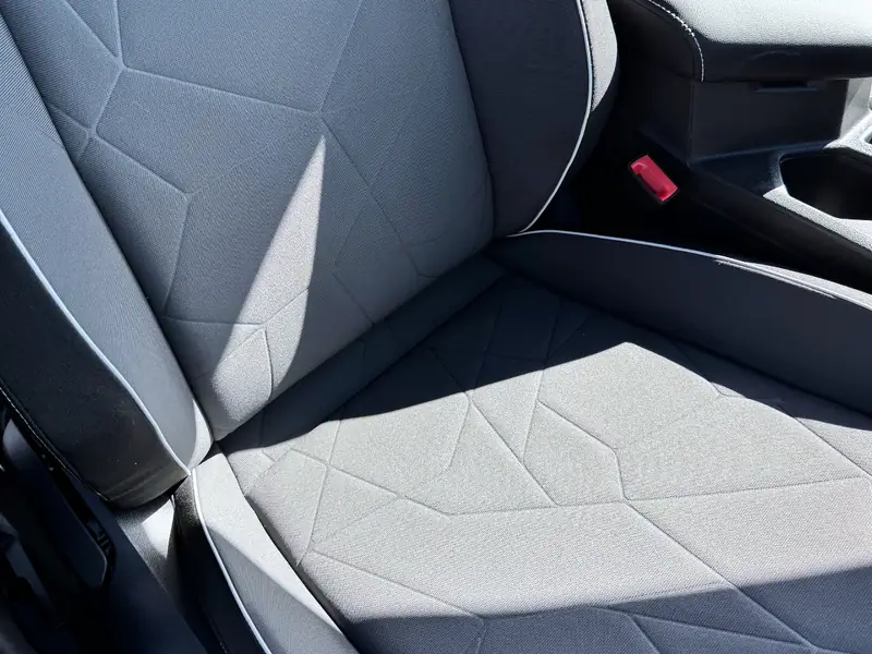 Cloth passenger seat after deep clean - stains completely removed