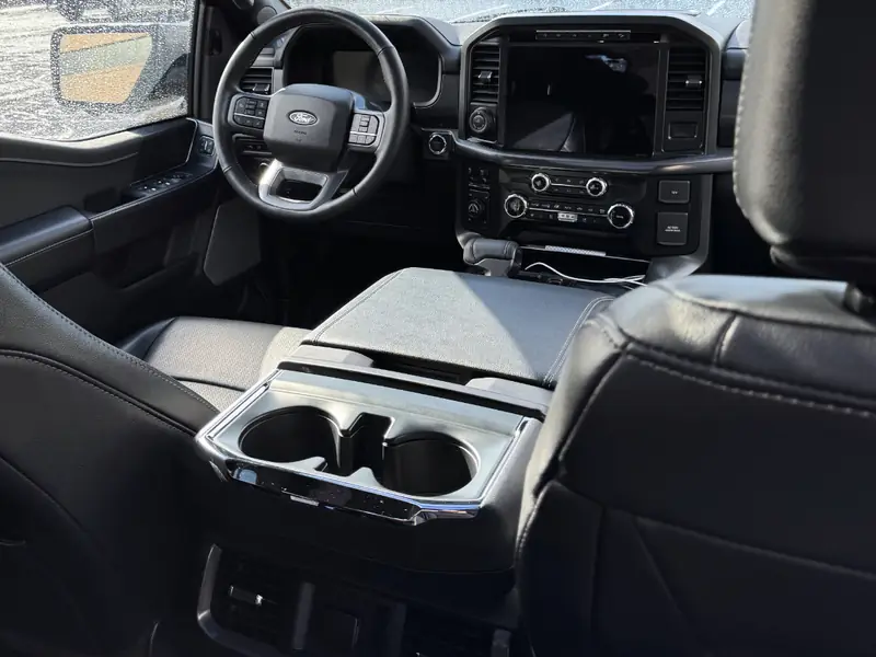 Ford interior dashboard view from back seat angle